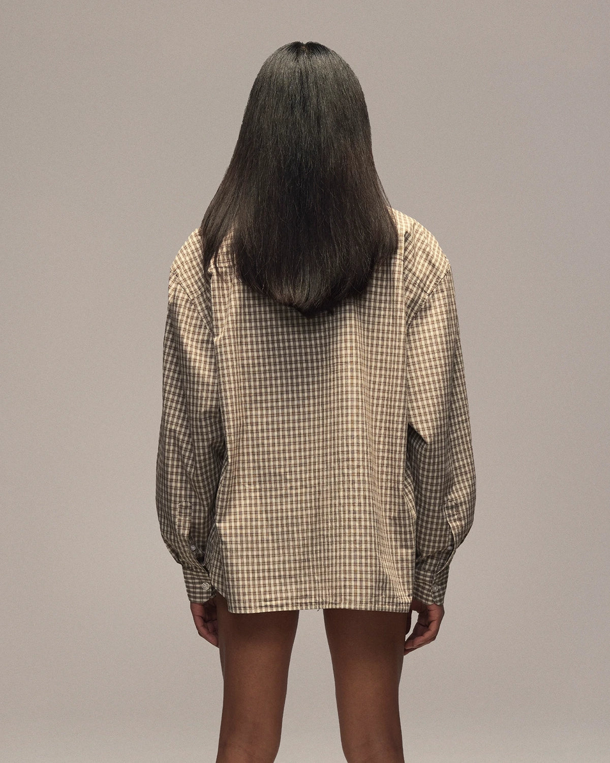 Sixth Bloom House Brown Check Shirt – back view, worn by woman