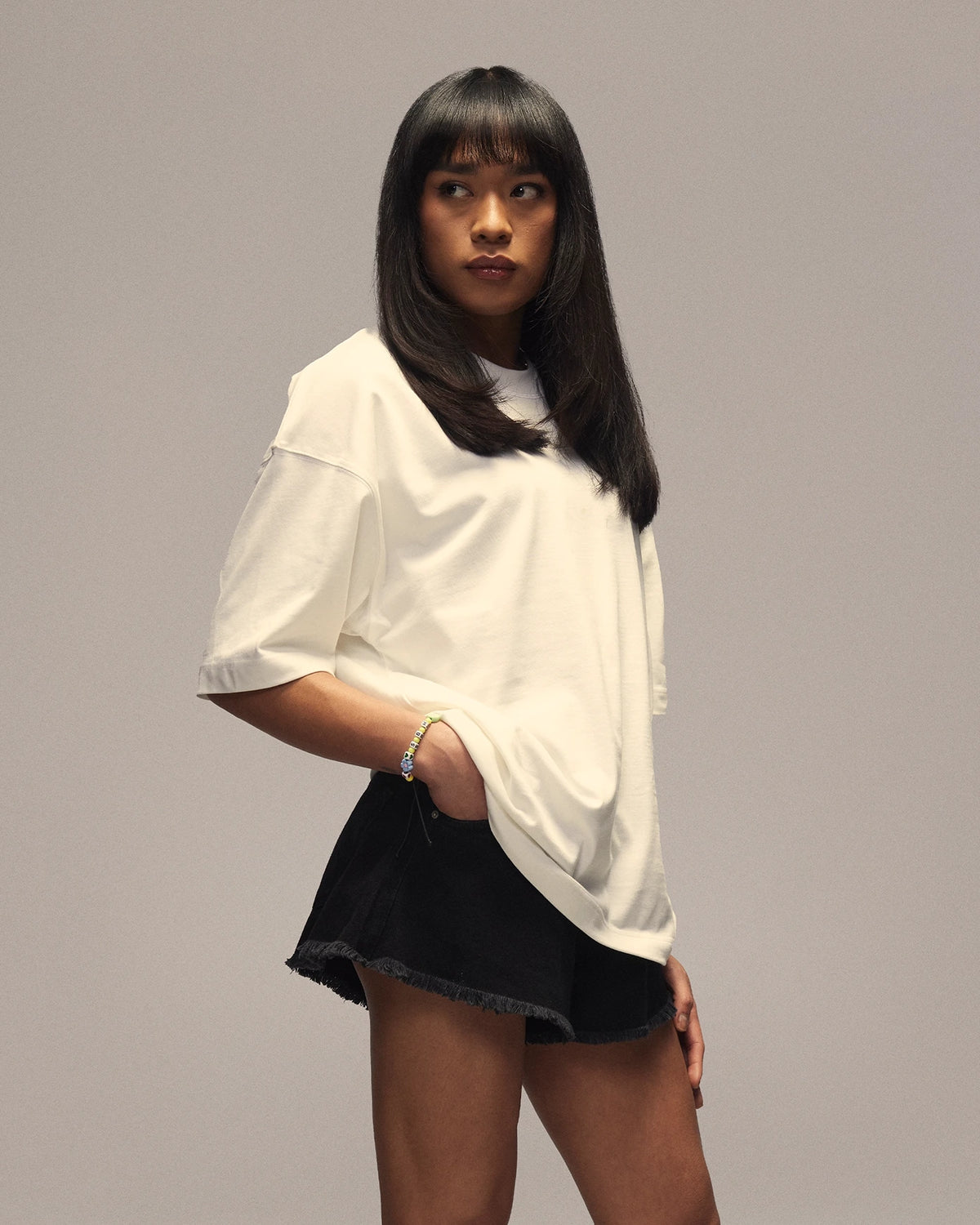 Sixth Bloom House Logo Blank T-Shirt White worn by model, side view