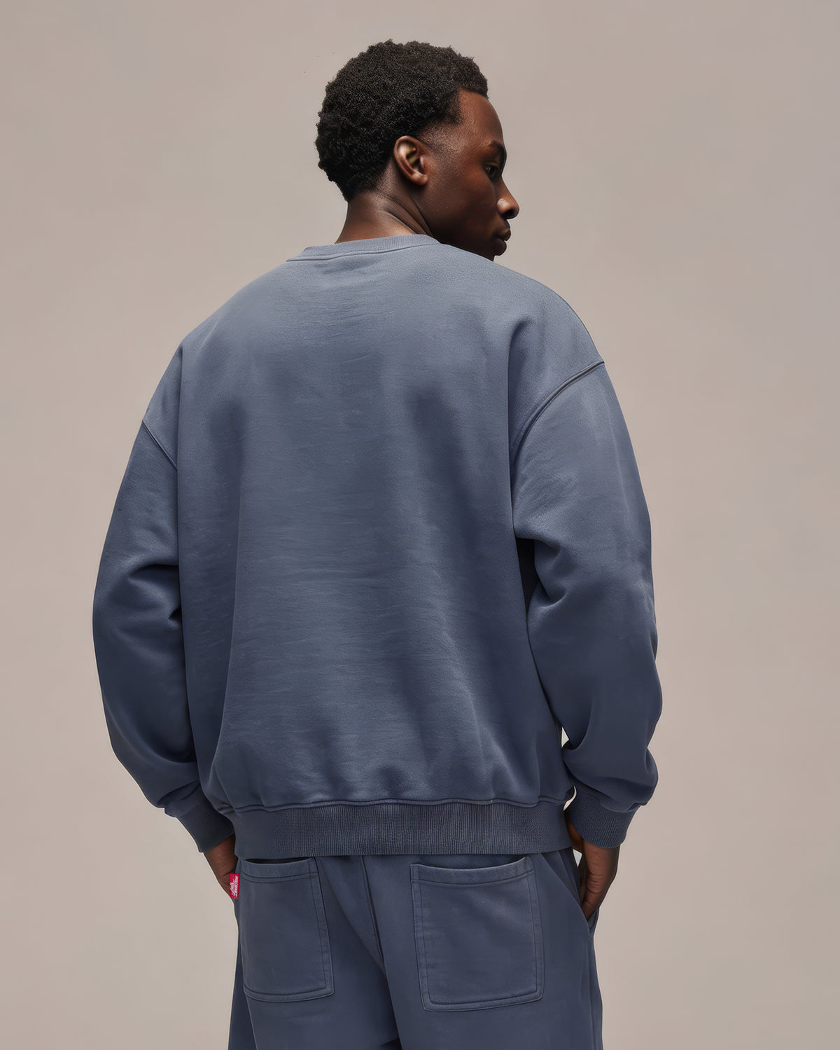 Sixth Bloom House Badge Sweater Blue – back view